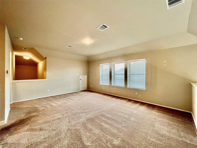 Foto del edificio - 8711 Windsong Trail Dr