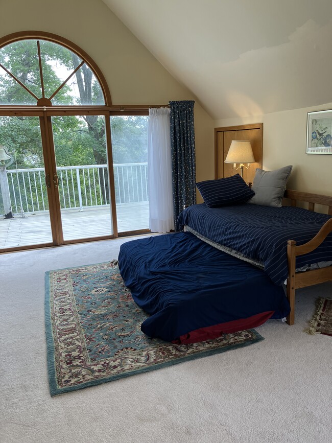 south view of master bedroom, daybed with trundle underneath and connecting upper level deck - 3645 Indian Lake Rd