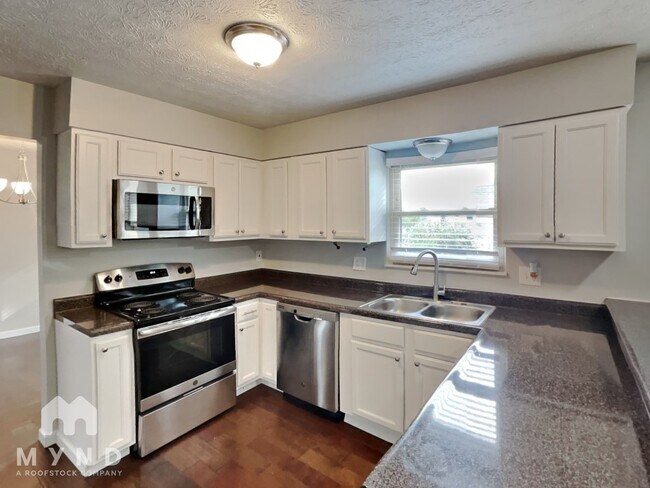 Foto del edificio - 6576 Canby Pl