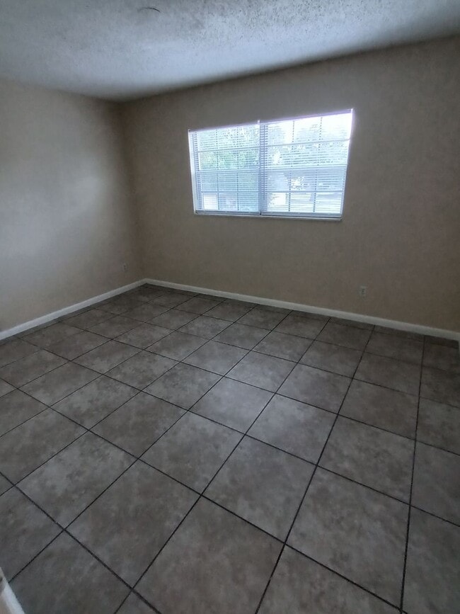Photo - 1 Bedroom Condo with Community Pool and La...