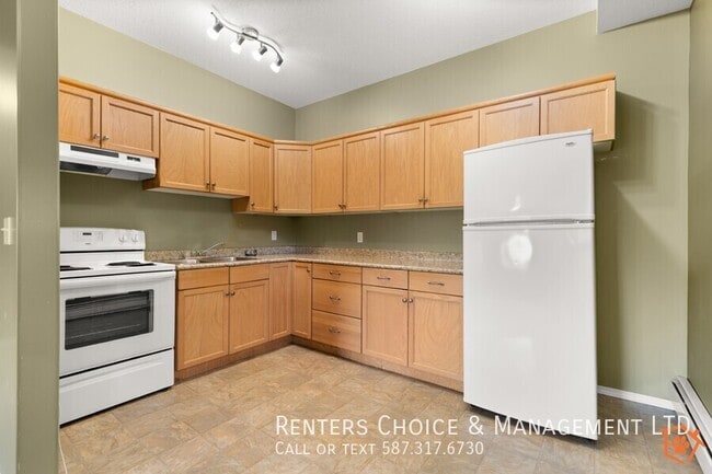Building Photo - Main Floor 2 bedroom Unit With Onsite laun...