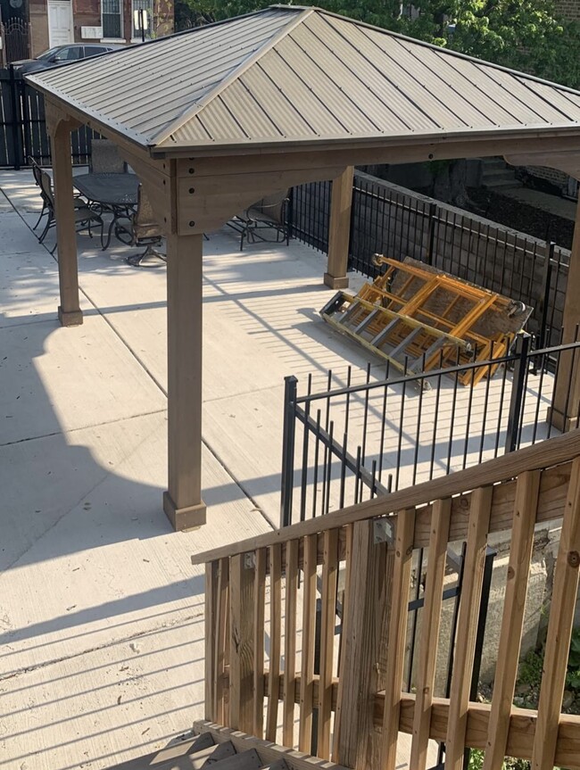 big cemented front yard w/ gazebo - 2719 W 24th Pl