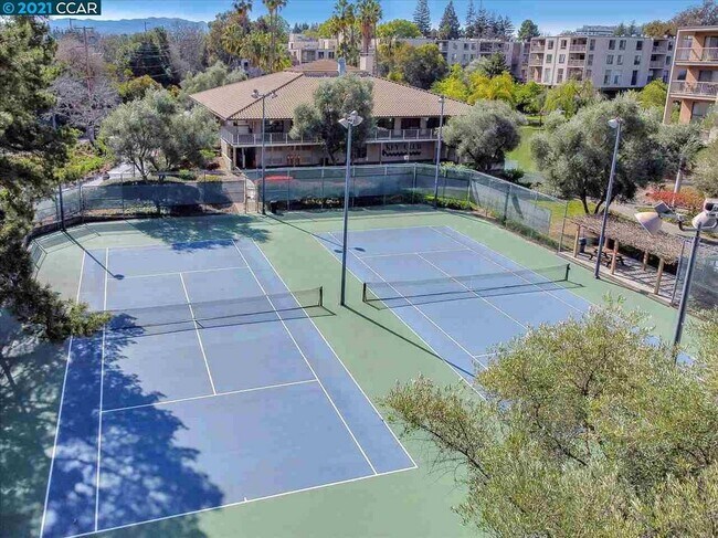 2 Tennis courts by clubhouse - 460 N Civic Dr