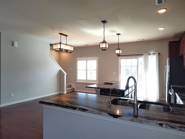 Building Photo - Charming, end-unit, townhome located in the Wrights Crossing Community!