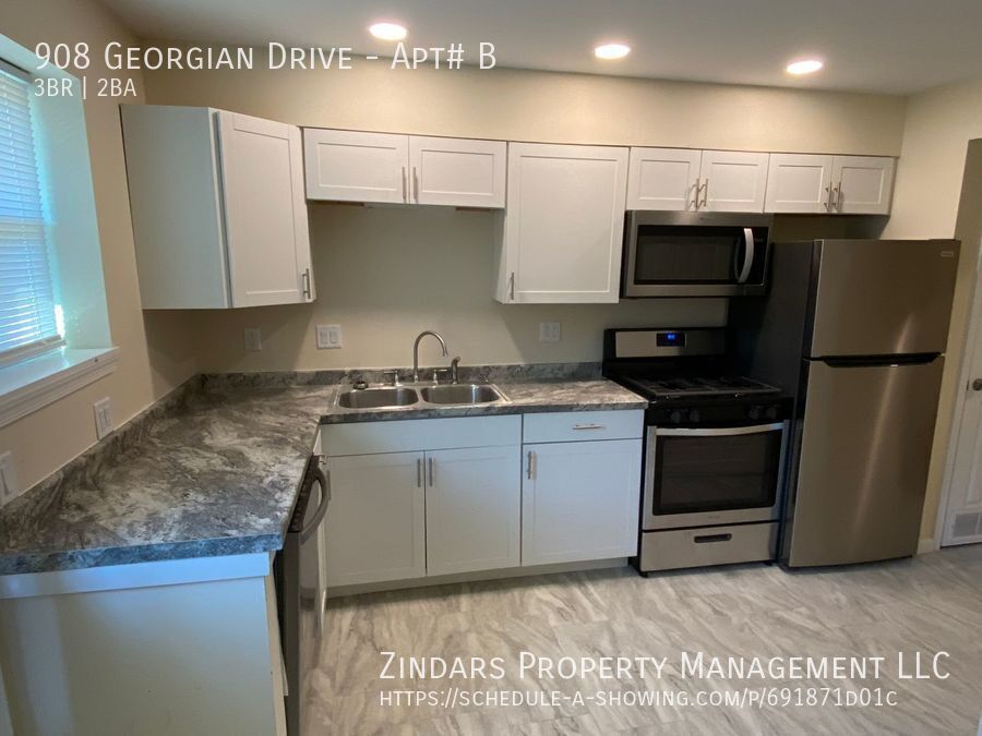 Foto principal - 908 Georgian Dr