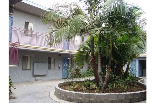 Photo - 6890 Paramount Blvd Apartment