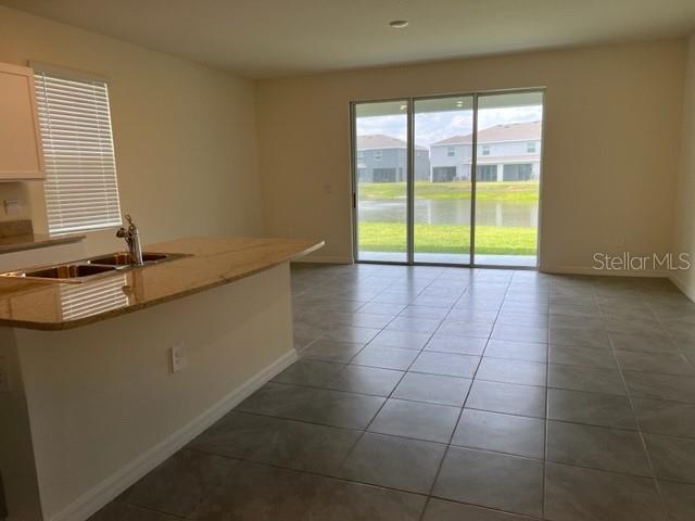 Building Photo - 8813 Milestone Dr