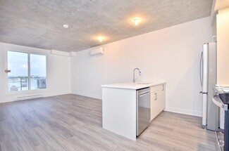 Building Photo - 1-1404 Av. de la Gare