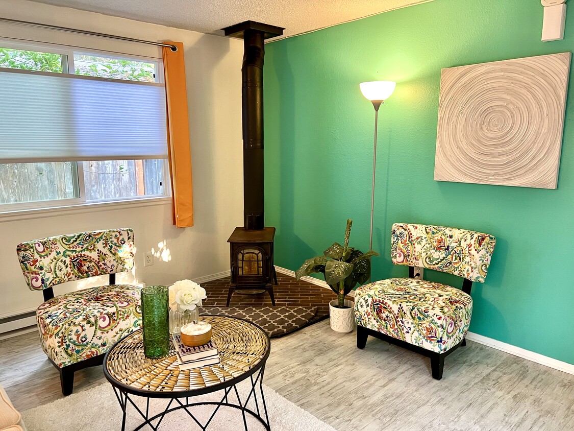 Living room with wood stove - 1614 Groves Ave NW