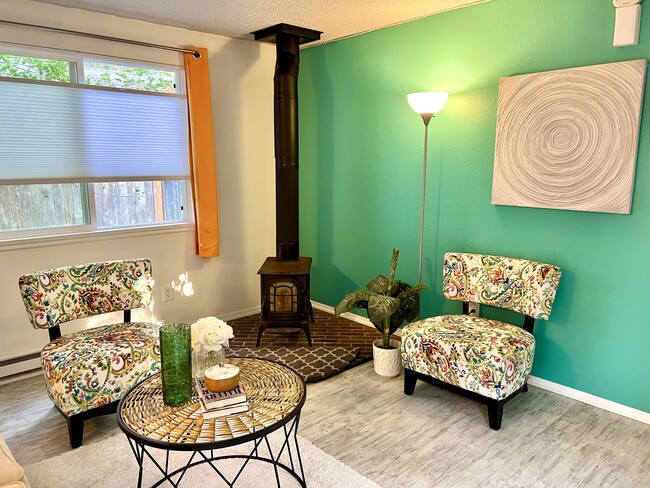 Living room with wood stove - 1614 Groves Ave NW