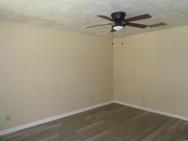 Building Photo - 7712 Impala Dr