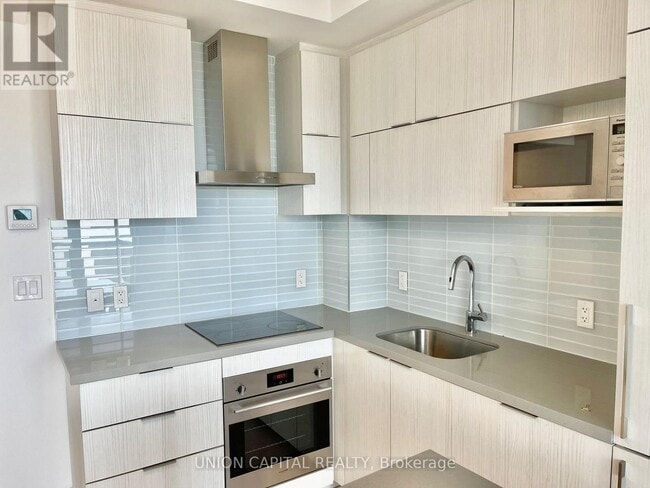 Building Photo - 10-1010 Rouge Valley Dr W