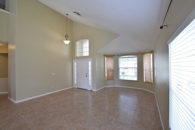 Foto del edificio - AMAZINGLY SPACIOUS 4-Bedroom Home with Loft in Gated Northshore at Lake Hart – Golf, Tennis & Lak...