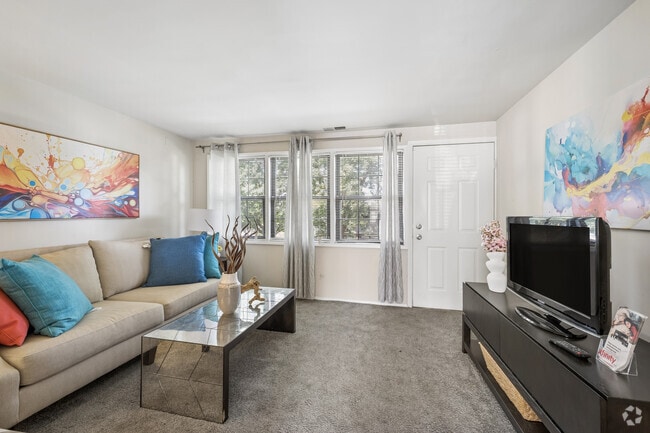 2BR, 1BA - 820SF - Living Room - Riverview Townhomes