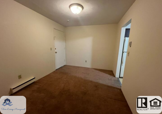 Building Photo - Charming One-Bedroom Condo with Bonus Room...