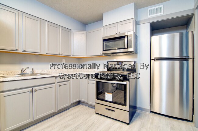 Foto del edificio - 4460 Powell Ave