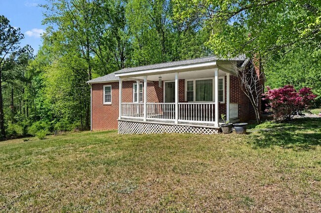 Building Photo - Dog-Friendly Updated Brick Rancher with Large Shaded Backyard