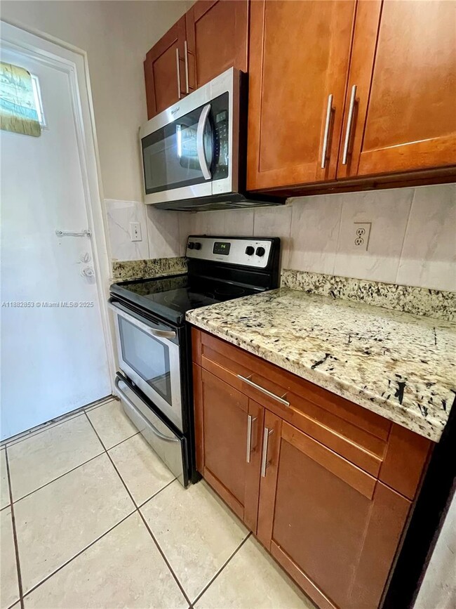 Building Photo - 10900 SW 104th St