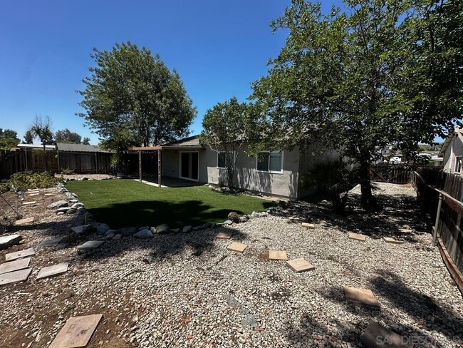Building Photo - 10017 Woodrose Ave