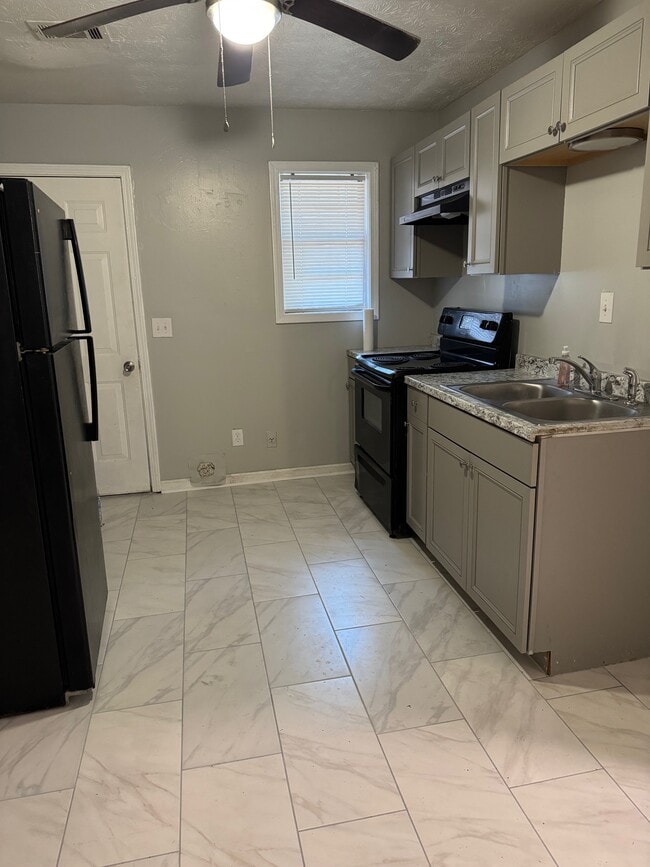 Kitchen with W/D Hookups - 6486 Raymond Dr