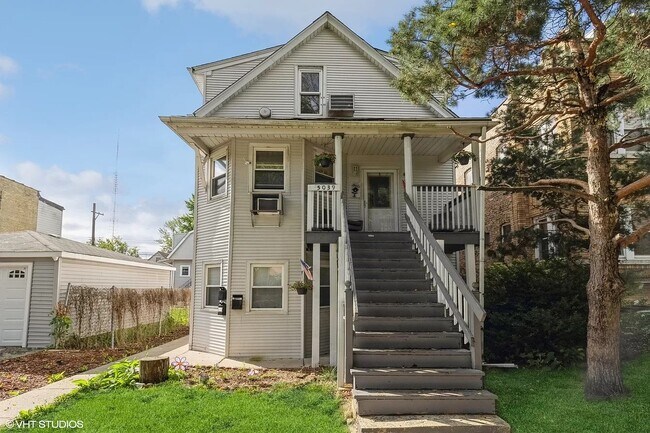 Foto del edificio - 5039 W Henderson St