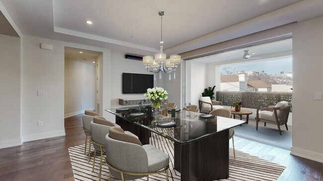 Virtually Staged Dining Area + Balcony - 460 N Palm Dr