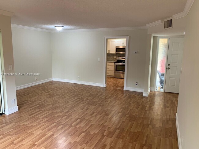Building Photo - 3775 Cocoplum Cir