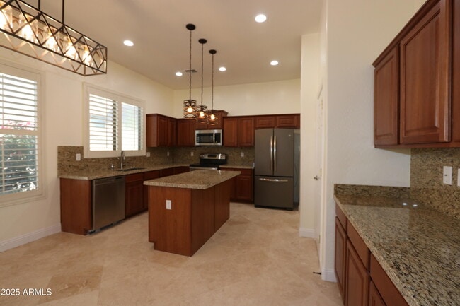 Building Photo - 10412 E Los Lagos Vista Ave