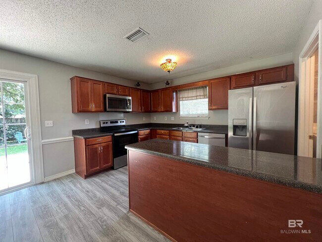 Foto del edificio - 8178 Gardenia Ct
