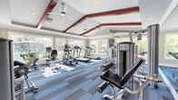 Located at 3924 Calibre Bend Lane in Winter Park, Florida, this fitness center offers a thoughtfully designed workout environment that balances function with architectural appeal. The space is defined by its dramatic vaulted ceiling, accented with bold red exposed beams that lend a distinctive visual character to the room. Recessed lighting and ceiling fans are integrated throughout, ensuring the space remains well-lit and comfortable during workouts.

Large, multi-pane windows line the walls on multiple sides, flooding the interior with natural light and providing expansive views of the surrounding outdoor areas, including what appears to be a pool and lush landscaping. This connection to the outdoors creates an open, airy atmosphere that enhances the overall workout experience.

The fitness floor is covered in stylish, multi-toned blue carpeting in a tile pattern, providing a durable yet visually appealing surface. The space is outfitted with a comprehensive selection of True-brand cardio equipment, including treadmills, ellipticals, and stationary bikes, alongside multi-station cable strength machines and a dumbbell rack. Wall-mounted mirrors on one side of the room further amplify the sense of space and allow users to monitor their form. The combination of high-end equipment, natural light, and refined architectural details makes this a standout community fitness facility.