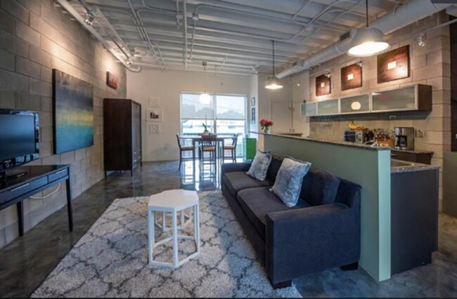 Building Photo - Sleek, Industrial-Modern Townhome in South...