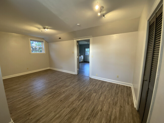 New floors, windows, lighting and walk-in closet in bedroom - 2031 Eversong Ln