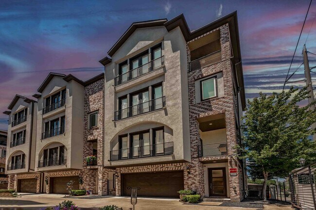 Building Photo - Luxury End Unit Rental with Elevator, Down...