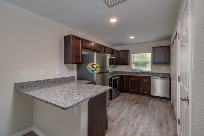 Foto del edificio - 9033 N Travis Dr