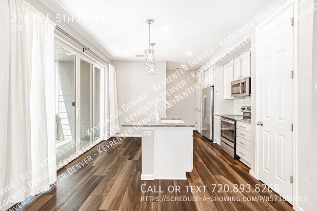 Building Photo - Luxury Living in Aurora: Your Dream Townho...