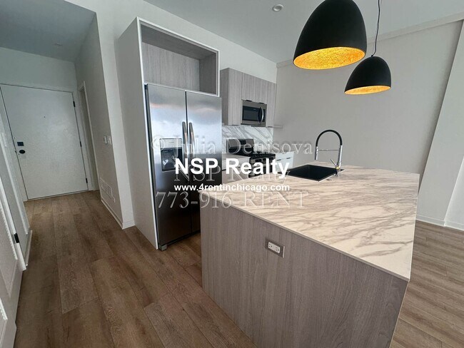 Foto del edificio - 6340 W Belmont Ave