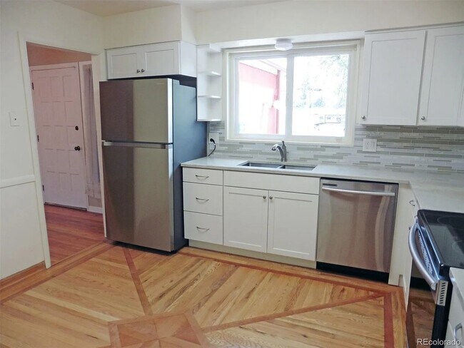 Photo - Spacious Littleton Home with Large Fenced Yard & Attached Garage!