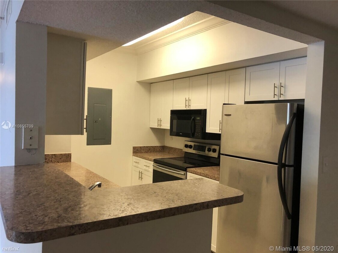 Primary Photo - 3 br, 2 bath Condo - 12203 Pines Blvd