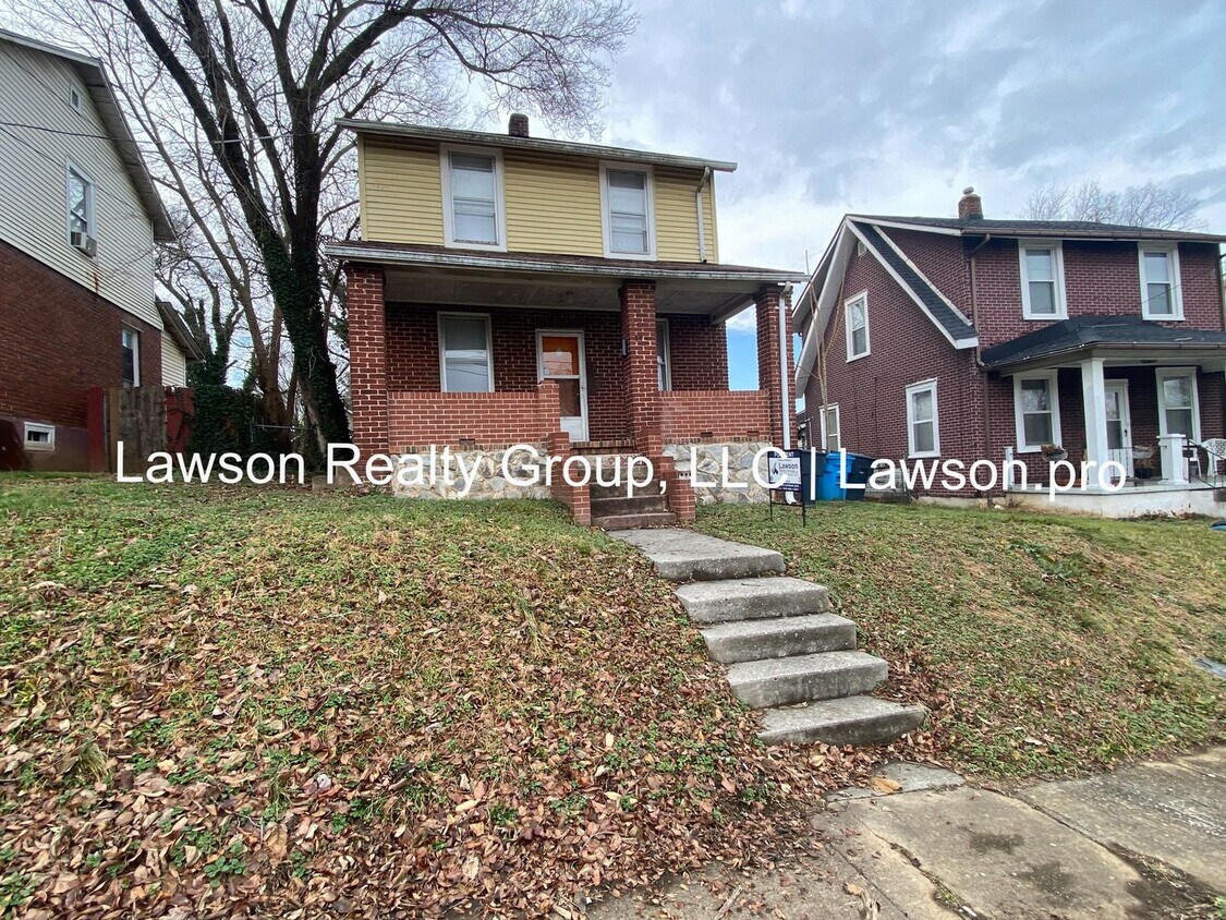 Primary Photo - Updated Three Bedroom with Flat Yard