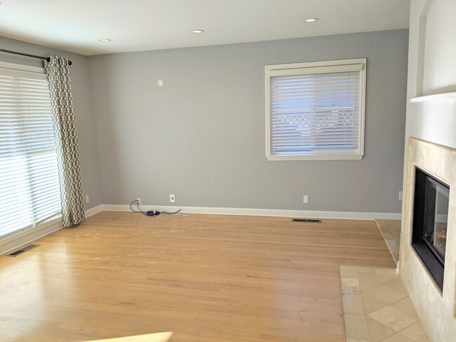 Living room with large picture window. Lots of natural light. - 2418 Villanova Rd