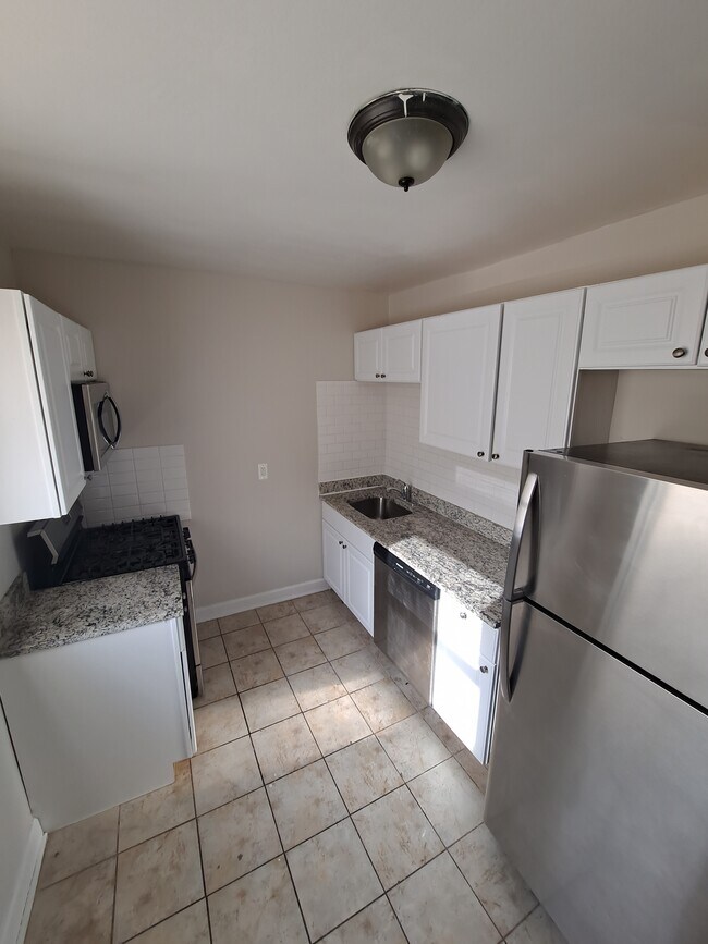 Foto del edificio - 7526-36 S Colfax Ave