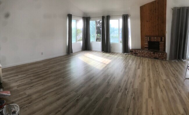 Great view from windows and lots of light in living room. - 3366 Pine Ave