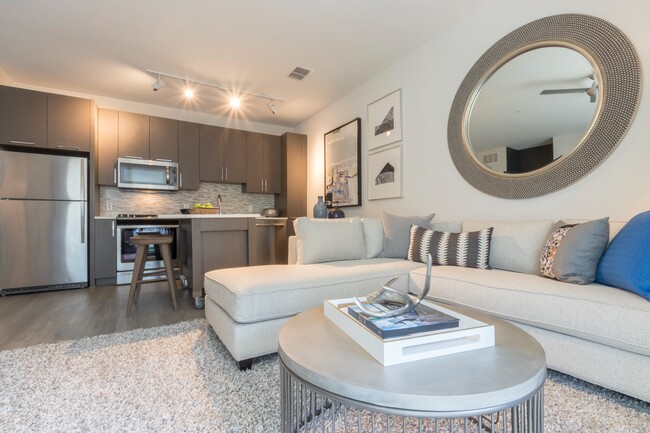 Check out our condominium-quality interior finishes  including light grain 42-inch wood cabinetry, stone counters, and tile backsplashes - Modera Midtown