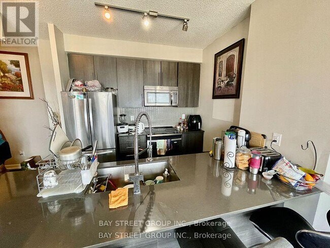 Building Photo - 326-4011-4011 Brickstone Mews