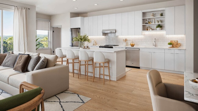 Kitchen with Stainless Steel Appliances and Breakfast Bar - The Basin