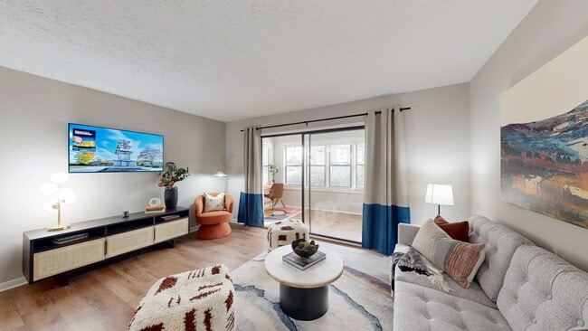 Newly Renovated Living Room with Private Sunroom - Rosemont at East Cobb Apartments