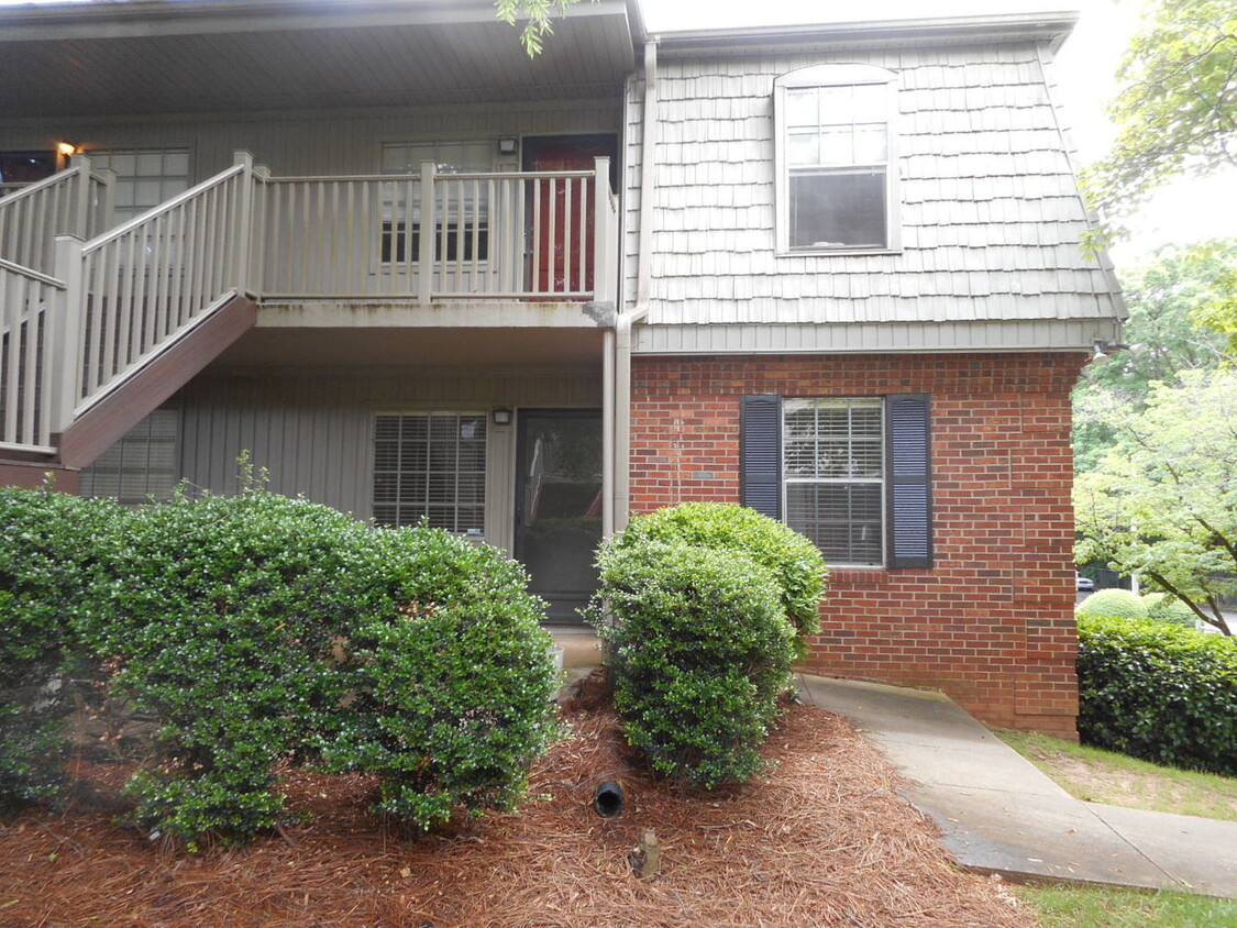 Primary Photo - MAIN LEVEL END UNIT OVERLOOKING POOL!