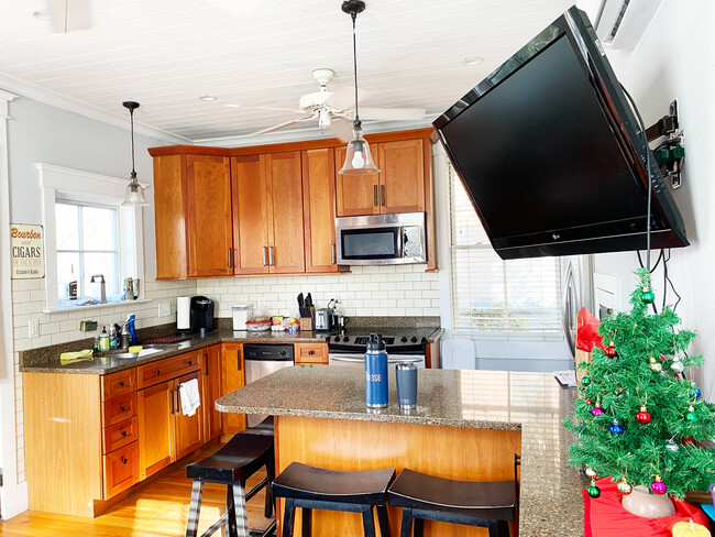 Kitchen with Large TV included - 206 Calhoun St