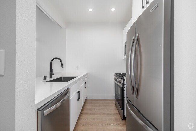1 dormitorio + altillo, 1 baño - 715 pies cuadrados - Cocina - The Norman