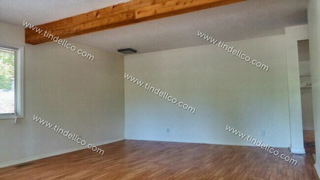 Building Photo - Darling Two Bedroom With Large Fenced Yard...